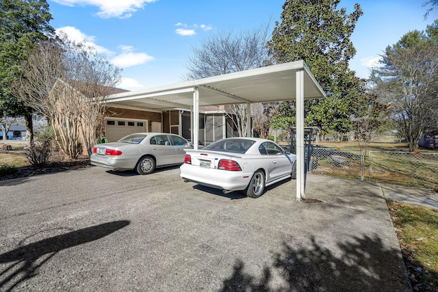 view of parking featuring a garage