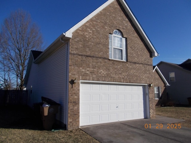 view of property exterior featuring a garage