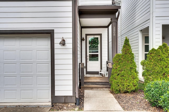 entrance to property featuring a garage