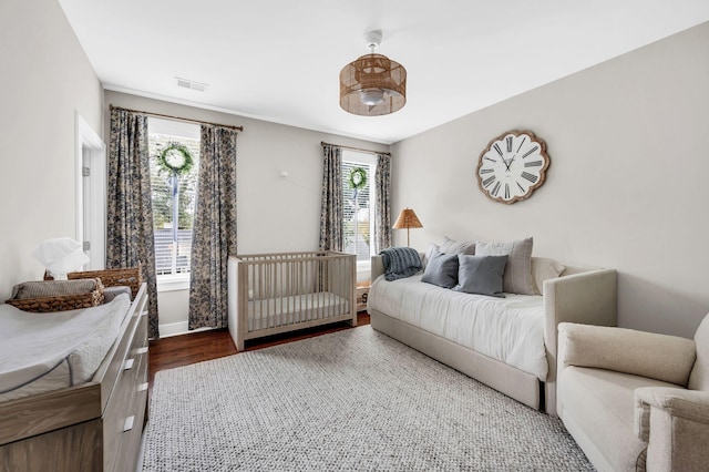 bedroom featuring wood-type flooring