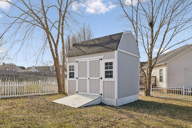 view of outbuilding with a lawn