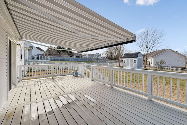 deck featuring a storage unit