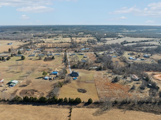 birds eye view of property featuring a rural view