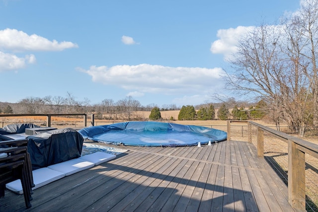 view of pool featuring a deck