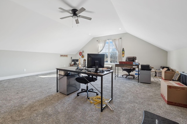 office space with ceiling fan, light colored carpet, and lofted ceiling