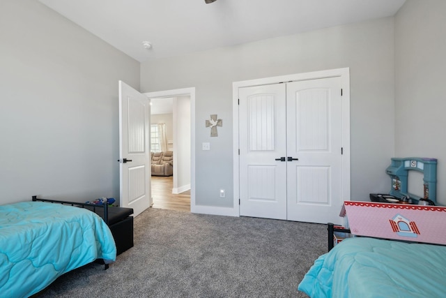 carpeted bedroom featuring a closet