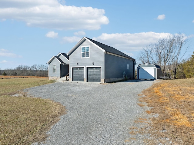 view of home's exterior with a garage and a lawn