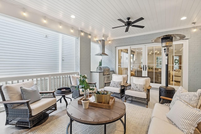 exterior space with wood ceiling and ceiling fan