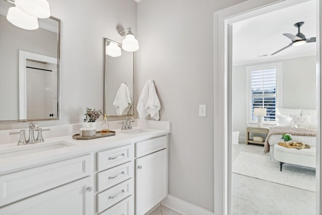 bathroom with ceiling fan and vanity