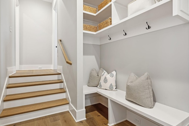 mudroom with light hardwood / wood-style floors