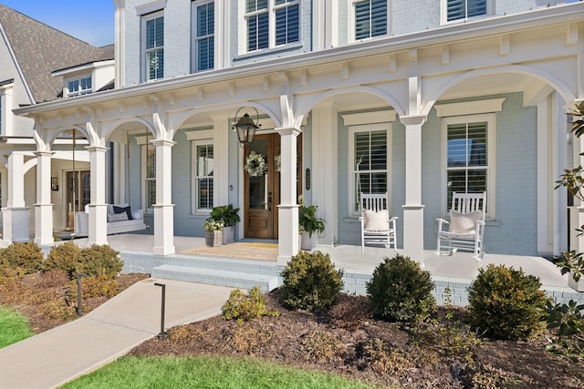 view of front of property featuring covered porch