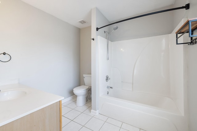 full bathroom with tile patterned flooring, vanity,  shower combination, and toilet