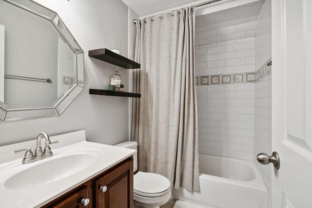 full bathroom with vanity, shower / bath combination with curtain, and toilet