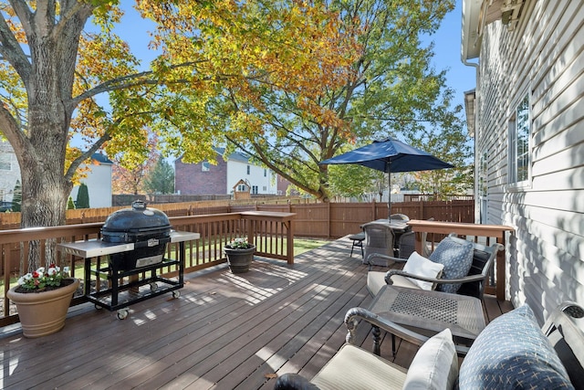 wooden terrace with area for grilling