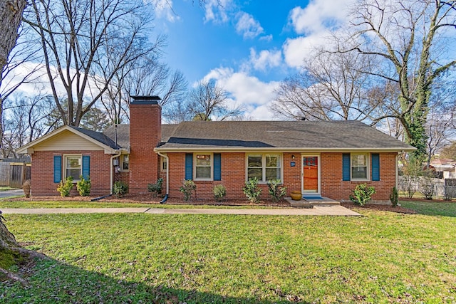 ranch-style house with a front lawn