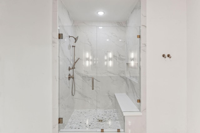 bathroom with an enclosed shower