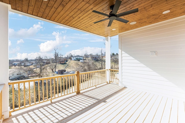 wooden terrace with ceiling fan