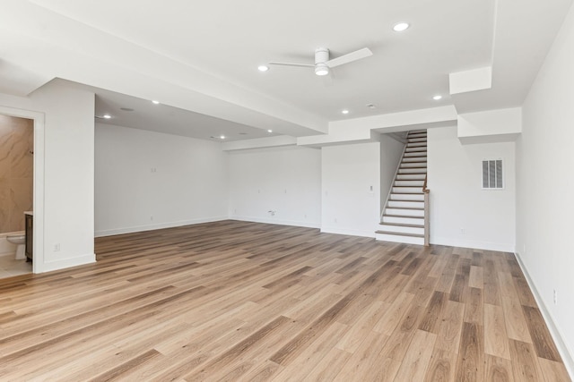 interior space featuring ceiling fan and light wood-type flooring