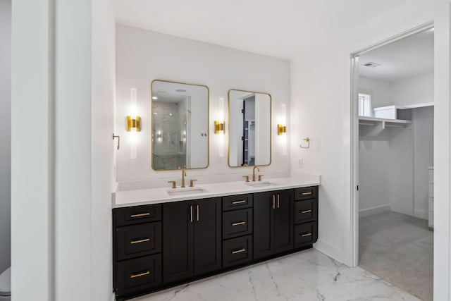 bathroom featuring vanity and walk in shower