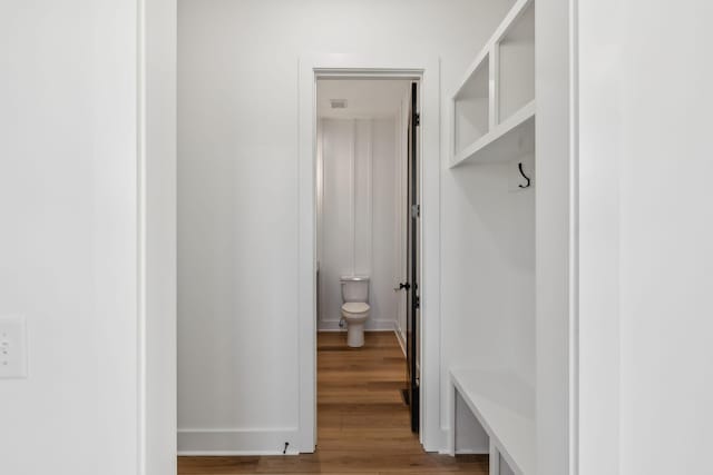 mudroom with wood-type flooring