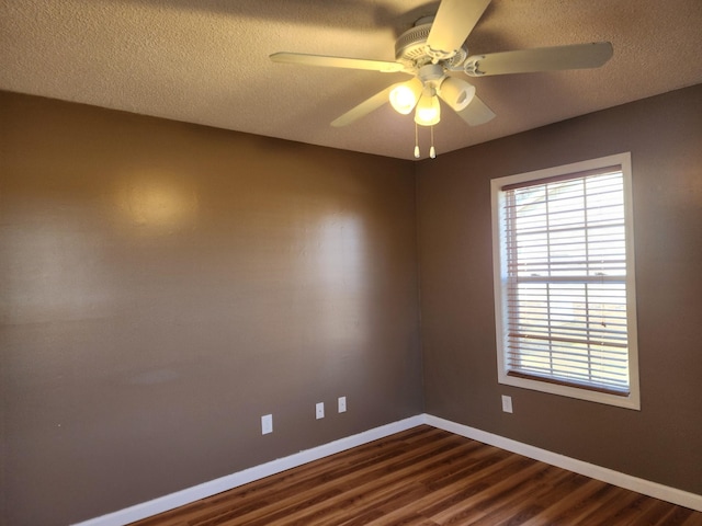 unfurnished room with hardwood / wood-style flooring, ceiling fan, and a textured ceiling