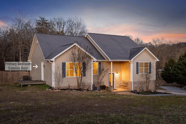 view of front of home with a lawn