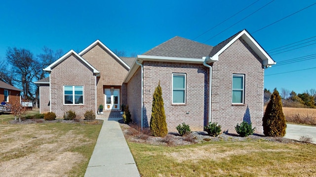 view of front of home with a front yard