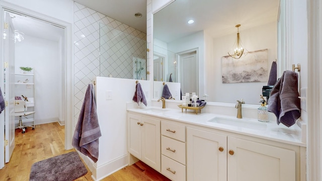 bathroom with hardwood / wood-style flooring and vanity