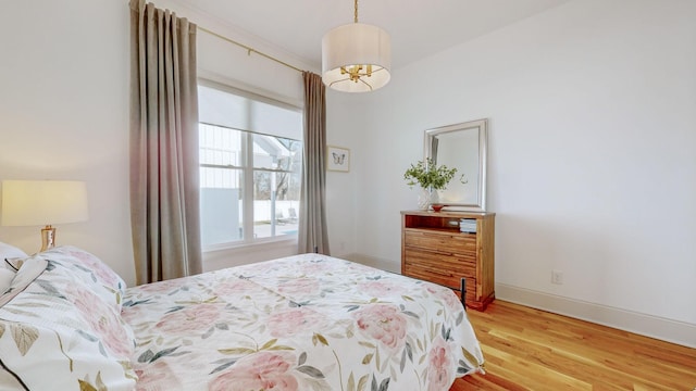 bedroom featuring hardwood / wood-style flooring