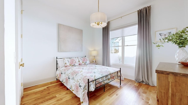 bedroom featuring light wood-type flooring