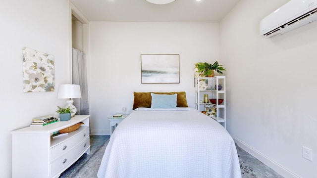 bedroom with an AC wall unit