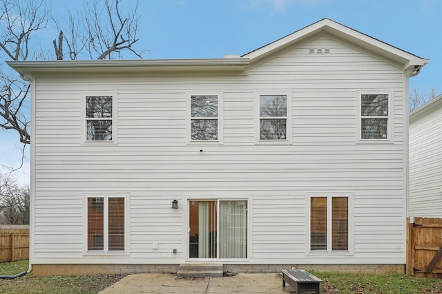 rear view of property with a patio area