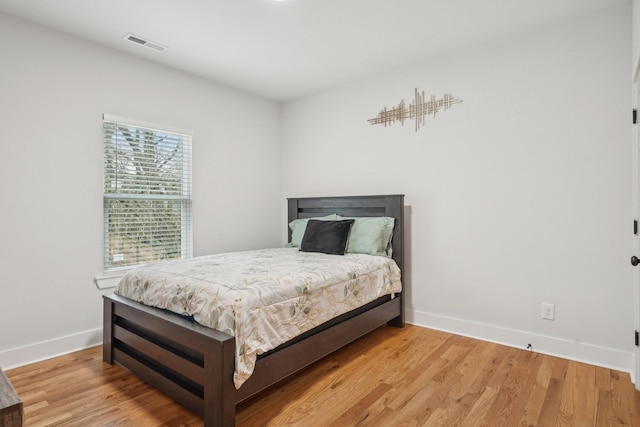 bedroom featuring light hardwood / wood-style floors