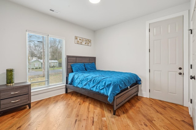 bedroom featuring light wood-type flooring