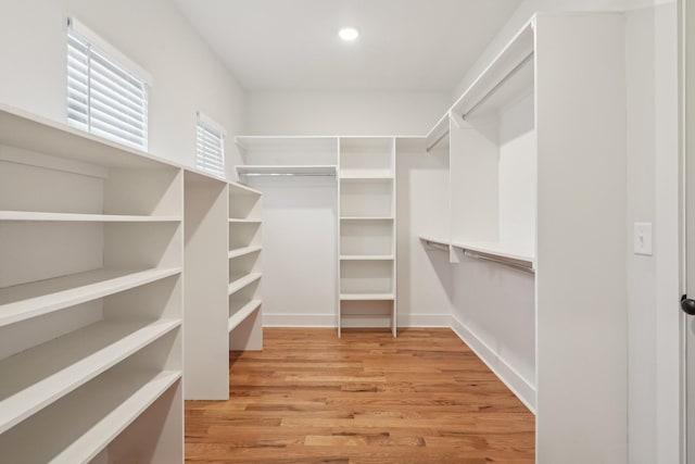 walk in closet featuring light wood-type flooring