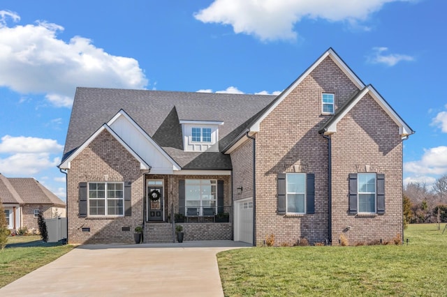 view of front facade featuring a garage and a front lawn