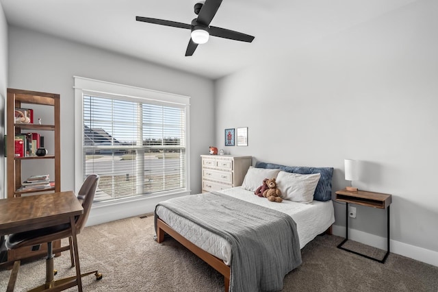 bedroom with ceiling fan and carpet