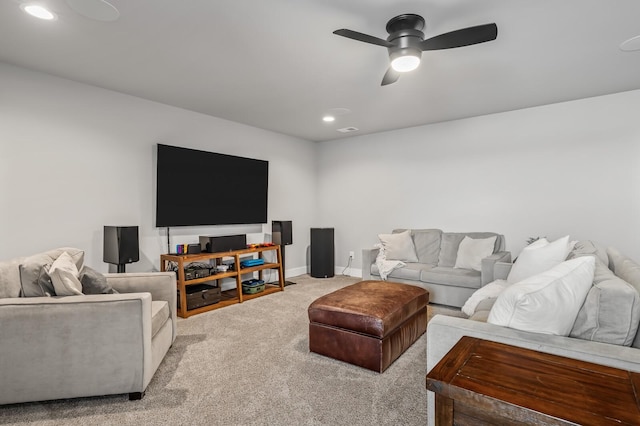 living room featuring ceiling fan and light carpet