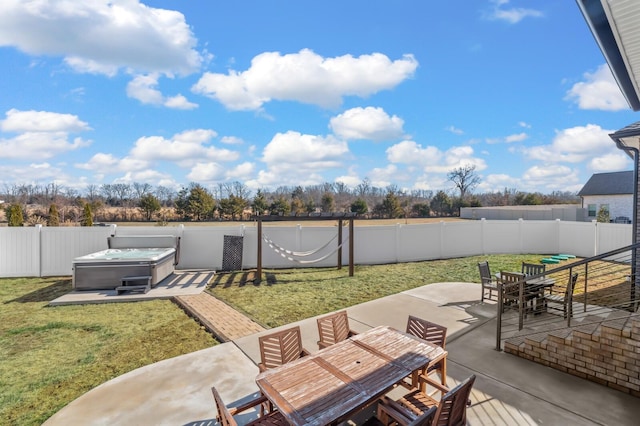 view of patio / terrace with a hot tub