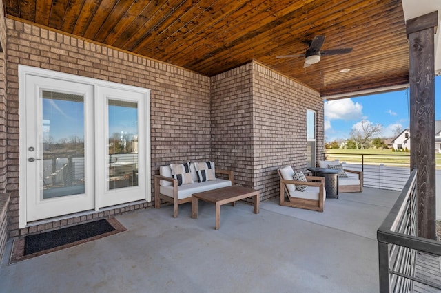 view of patio / terrace featuring french doors, ceiling fan, and outdoor lounge area