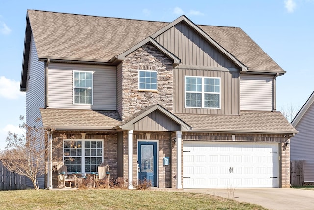 craftsman-style house with a garage and a front yard