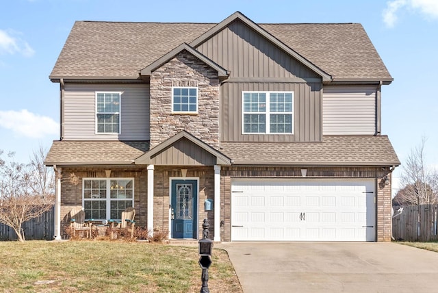 view of front facade featuring a garage and a front yard