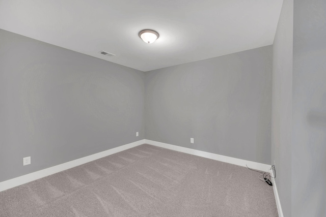 unfurnished room with carpet