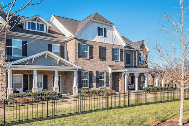 view of front of home with a front lawn and a porch