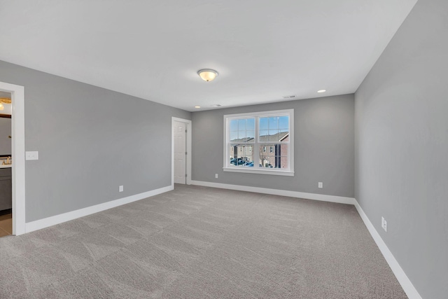 view of carpeted spare room