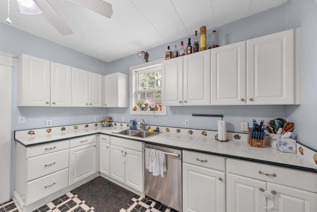 kitchen featuring white cabinetry, sink, and stainless steel dishwasher