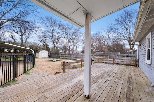 deck featuring a storage unit