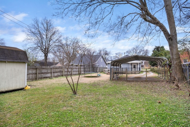 view of yard featuring a carport