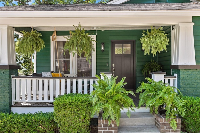 entrance to property with covered porch