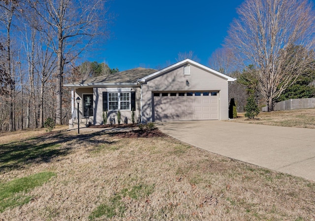 single story home with a garage and a front yard